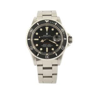 Montre pour homme Rolex Référence 1680 rouge Submariner Date de 1972 avec boîtier et bracelet en acier inoxydable (est. 25,000 30,000 à XNUMX XNUMX $ CA).