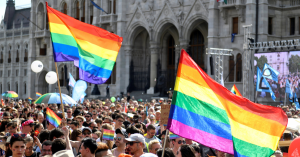 Hungarian people protesting ath House of Parliament against the anti-LGBTQ law
