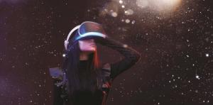 Young woman using a VR headset in a fantasy setting