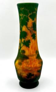 Daum Nancy glass vase of baluster form, 21 inches tall with a tall extended neck, colorfully decorated wall. Estimate: $2,500-$5,000.