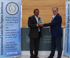 Professor Jiju Antony is handed the ILSSI Lifetime Outstanding Contribution award from Chairman, John Dennis., at the Edinburgh Business School, Scotland.