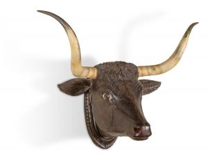 Hand-carved wooden bull head with real horns and Wild West story, hung in Shotgun Ben Thompson's Bulls Head Saloon in Abilene, Kansas (12,650).