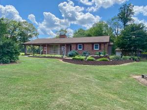 3 BR/3 BA ranch style brick home w/finished walk-out basement on 2.7± acres -- 24'x60' shop/garage w/attached covered carport -- 40'x52' equipment/storage building -- Great opportunity for a home based business