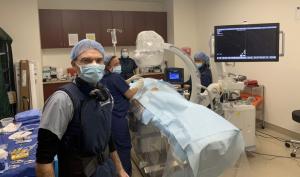 Dr. Geschwind in procedure room with his team getting ready to treat a liver cancer with Y-90 Selective Internal Radiation Therapy.  patient