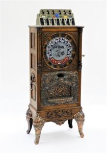 Circa 1904 Caille Brothers (Chicago) Eclipse 25-cent vertical slot machine, a 63-inch model with vertical wheels (estimate: $ 10,000- $ 15,000).