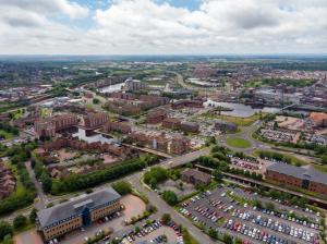Aerial photo of the UK town of Middlesbrough a large post-industrial town on the south bank of the River Tees in the county of North Yorkshire, taken on a bright sunny day