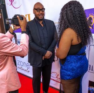 Celebrity stylist Timothy Snell poses for a picture on the red carpet of the 2019 Full Figured Industry Awards