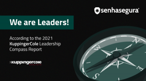 The image shows a compass between north and south to connote the leadership of senhasegura - provider of Privileged Access Management solutions for the cybersecurity of corporate systems - in the Leadership Compass 2021 report, produced by German technolo