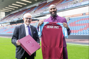 Malcolm Jenkins poses with Burnley FC President Alan Pace.