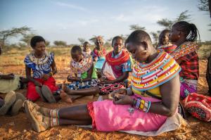 The ladies of the beadWORKS artisan group in rural northern Kenya, making tribal jewelry and unique gifts for sale on NOVICA.com.