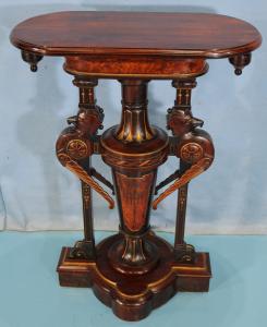 Unique Aesthetic Movement pedestal table in rosewood (estimate: $ 4,000 - $ 10,000).