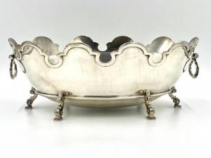 Large monteith Tiffany & Company, circa 1966, mounted on baroque scroll legs, weighing 109.375 oz.  Troy ($ 4,305).