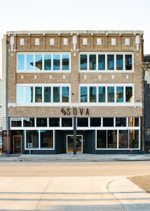 The exterior of a new hotel in Dallas, SOVA, a boutique hotel that recently joined Stash Hotel Rewards.