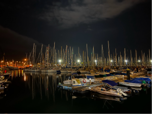 Picture taken at night of multiple yatchs in harbour in Las Palmas awaiting the start of ARC 2021