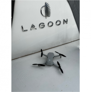 Photo of the Lagoon logo and a DJI drone