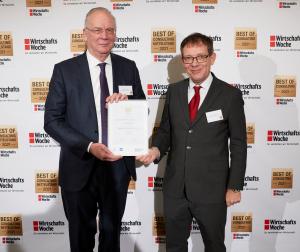 Michael Dirkes and Dr. Patrick Schmidl of Deutsche Mittelstandsfinanz at the award ceremony