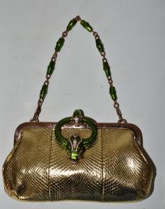 Rare and unusual Gucci evening bag circa 1984 with enameled crystal snakehead clasp.