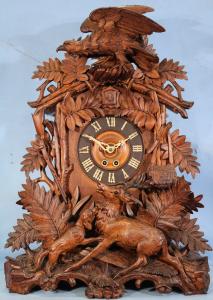Clean, original shelf clock made by Alexander Fleig, circa 1880, with a rare and unusual hunting scene  (estimate: $5,500-$8,500).