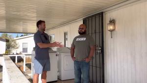 A photo from one of Mobile Home Dreamin' client's testimony with Jeff on the left and the client on the right.