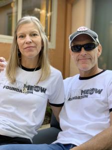 Elena Matyas and Doug Forbes at an event for their camp safety nonprofit Meow Meow Foundation