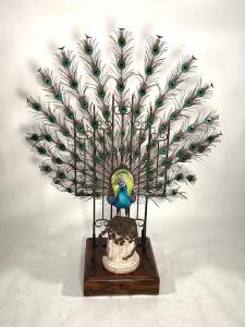 Spectacular Albany porcelain from England, bronze and enamel peacock on stand, 60 inches tall, the bird in brightly enameled bronze ($5,842).