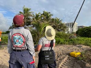 Two CRASAR pilots monitor drones in the air in the aftermath of Surfside Condo Collapse