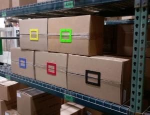 Close and Identify Stored Boxes Without Tape Using Box Latch Colors
