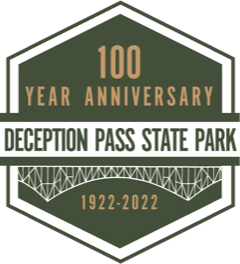 Green hexagon logo with the words 100 Year Anniversary Deception Pass State Park 1922-2022 and a rendered image of the pass