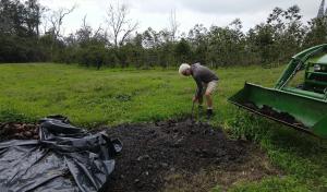 Farmer Steve Wynn composting