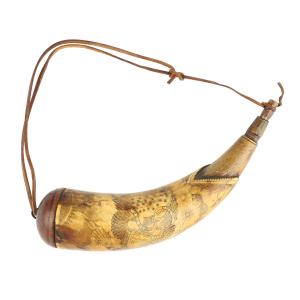 Powder horn signed John Tansel (Kentucky, 1800-1872), carved with a federal eagle with armored chest (est. CA$15,000-$20,000).