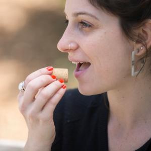 Millennial girl eating Pasokin Peanut Butter Bites