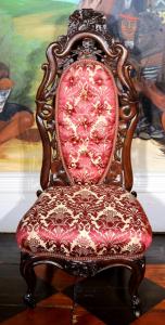 Rosewood laminated slipper chair with great upholstery by Belter, 3 feet 11 inches tall (est. $1,000-$2,000).
