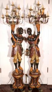 1940s-era pair of hand-carved blackamoors, 79 inches tall (est. $2,000-$4,000).
