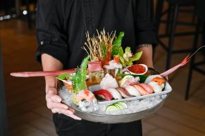 Highlights include this sushi and sashimi tasting platter for $50 that features fresh seafood selections flown in from Toyosu Fish Market.
