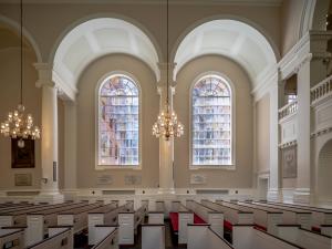 At All Souls Church in Manhattan, light fills the sanctuary through restored antique-style windows.