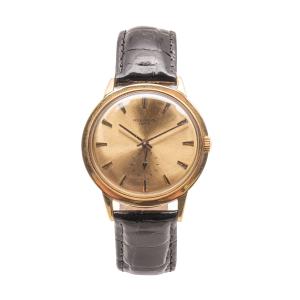 1960s-era Swiss Patek Philippe Calatrava watch (Ref. 3542), 18kt yellow gold with a nice crocodile strap, stamped for 18kt gold on the inner caseback and inside lugs (CA$11,800).