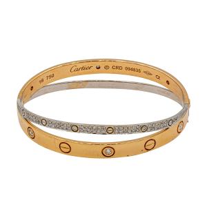 Cartier stamped rose and white gold lady’s hand-assembled bracelet with fold-over clasp and a bright polish finish, with cross-intersecting bands of diamonds set in white gold (CA$7,080).