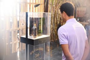A patron viewing the Appleton Estate Independence Reserve Limited Edition 50 Year Old Rum on display at the Jamaica Rum Festival.