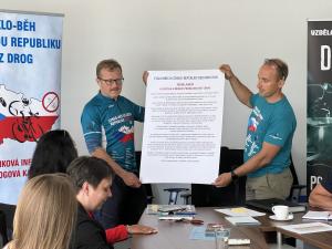 Drug Free World volunteers in Czech city halls, showing the Drug Free Promise