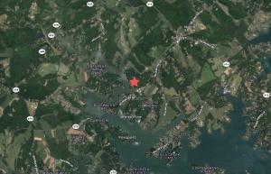 .68 +/- acre wooded lot in the Stripers Landing Community of Smith Mountain Lake