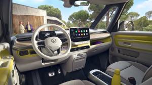 FULL INTERIOR SHOT OF THE ICONIC VW ID.BUZZ CAMPERVAN, SHOWING COLOUR TRIM AND DIGITAL DISPLAYS