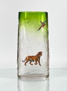 Circa 1890-1900 Moser vase engraved with a tropical landscape of palm trees centered by a high relief sculpted enamel figure of a striding tiger and a parrot (est. $1,200-$1,800).