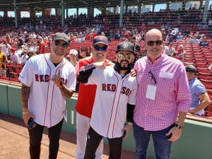 Standing right to left: Jose Alberto Silva, Yandel, Boston Red Sox Manager Alex Cora, Wisin. Image: Grupo Silva.