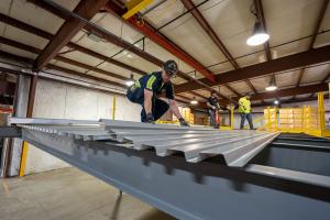 worker-installing-steel-decking