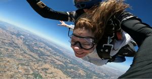 60-year-old first time skydiving birthday girl, Fine Art and Real Estate Broker Anna D. Smith fearlessly Vogueing her way through it.