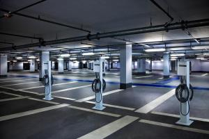 EvoCharge Concealed Pedestal Charging Stations in parking garage
