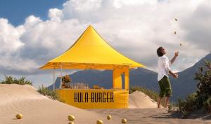 Hula Burger Corporation's Hawaiian Luau Party Plan gives tourists a chance to experience the HULA-BURGER, Hawaiian Taro Chips & a Big Kahuna Coconut Milk Shake!