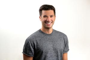 An image of Clarity Value founder and CEO Cristian Robiou smiling and wearing a gray shirt.