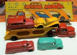 Tootsietoy car carrier set #207 from 1955 with the original box and including four vehicles.  The set shows some signs of wear but still should go for $1,000-$5,000.