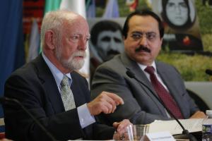 Steven Schneebaum (left) discussing the grounds for a complaint filed in New York against Ebrahim Raisi for crimes against humanity and genocide in a Washington, DC press conference organized by NCRI-US, August 25, 2022.